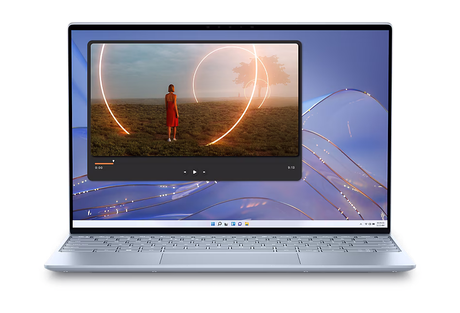Picture of a Dell XPS 13 9315 Laptop with a video player on the screen.