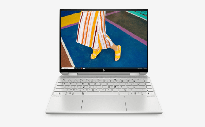 Silver Laptop with a full screen image visible on the display 