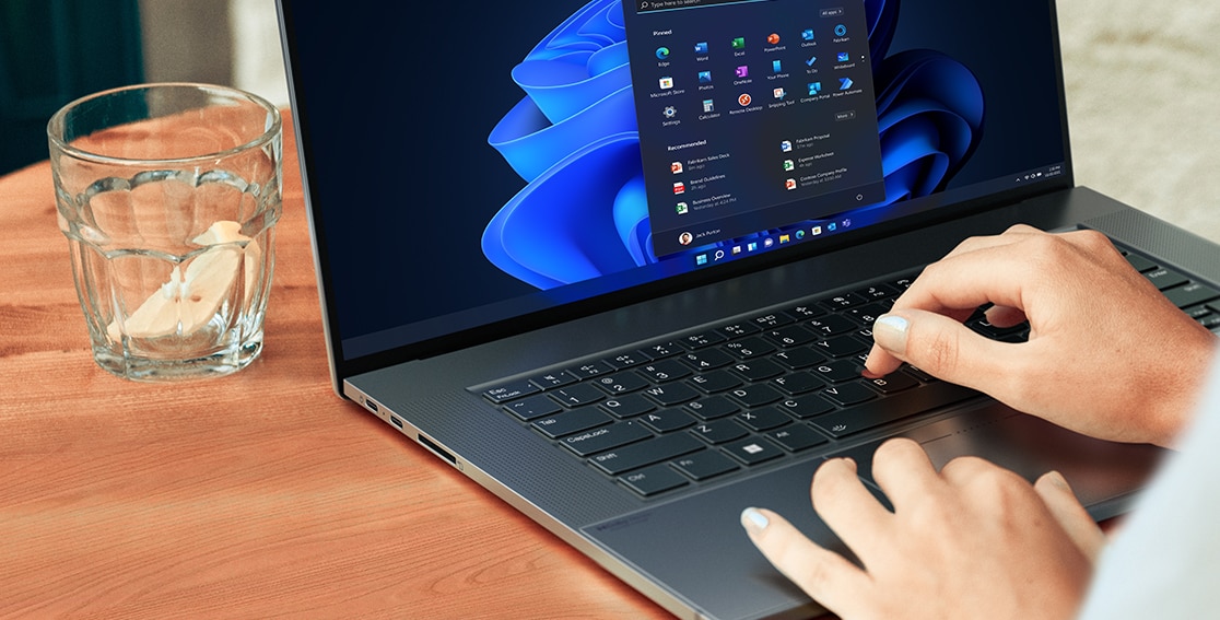 Close-up of keyboard and bottom of display on the Lenovo ThinkPad Z16 laptop in use.