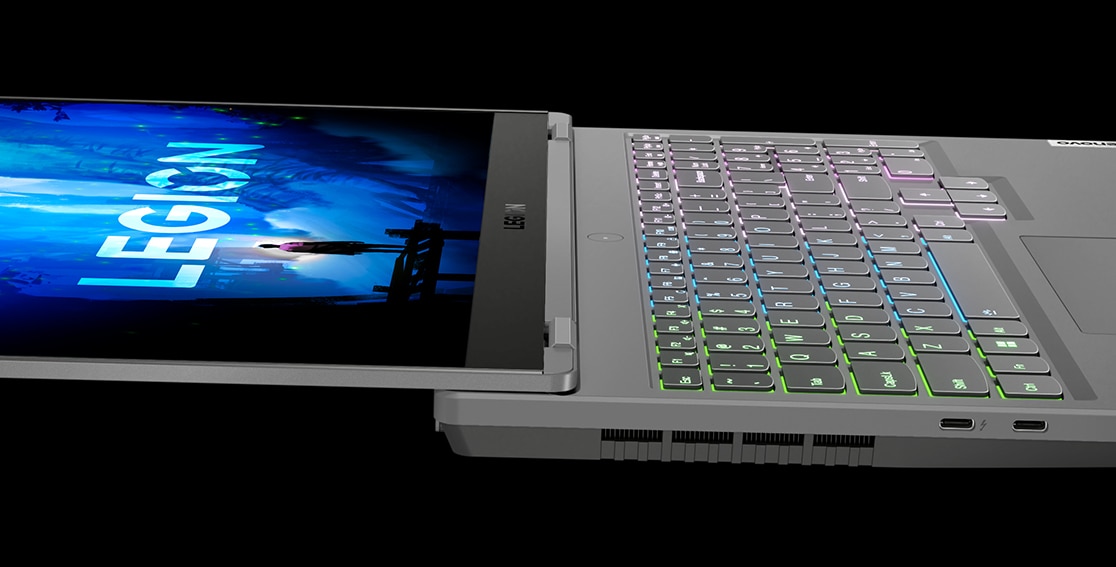 Legion 5 Gen 7 (15'' Intel) en Storm Grey, à plat, vue du côté gauche, Windows 11 à l’écran